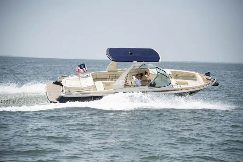  Yacht Photos Pics 2022 Chris-Craft Launch 25 GT boat cruising on open water.