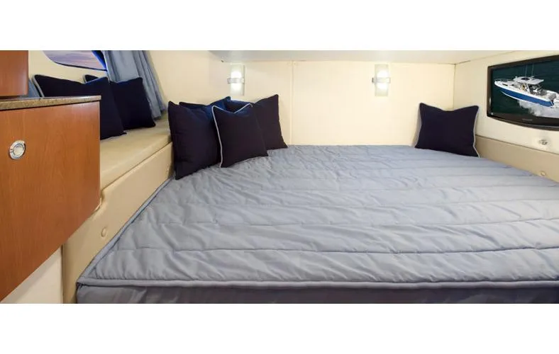  Yacht Photos Pics Manufacturer Provided Image: 2015 Intrepid 400 Cuddy cabin interior with bed and pillows