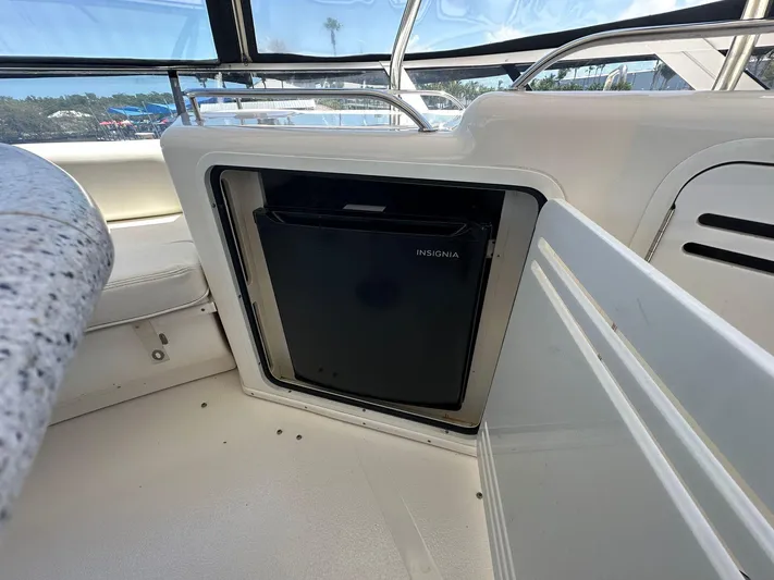 Anna Yacht Photos Pics Mini fridge on 2001 Sea Ray 560 Sedan Bridge yacht, open compartment view.