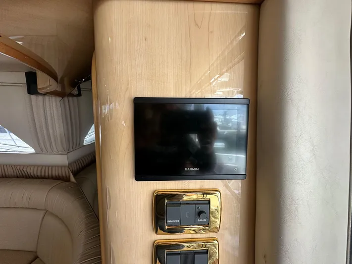 Anna Yacht Photos Pics Control panel and screen inside 2001 Sea Ray 560 Sedan Bridge yacht.