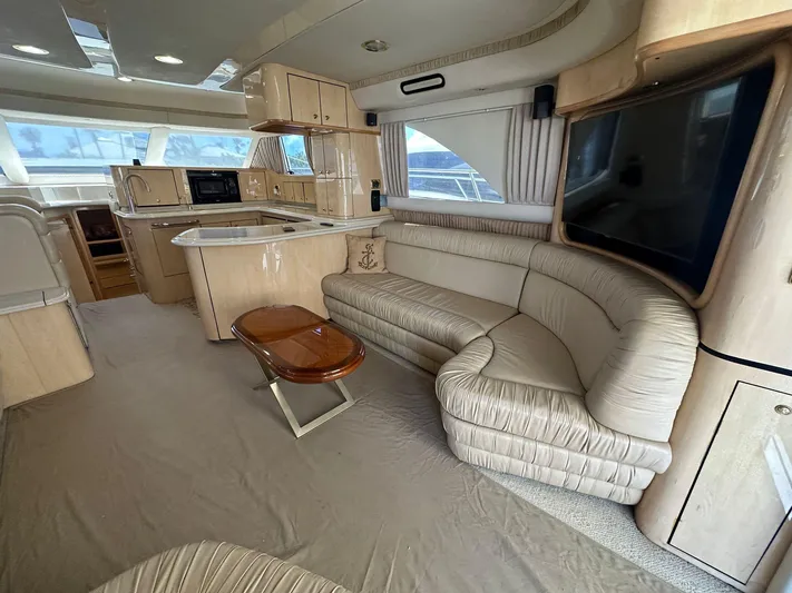 Anna Yacht Photos Pics Luxurious interior of a 2001 Sea Ray 560 Sedan Bridge yacht with elegant furnishings.