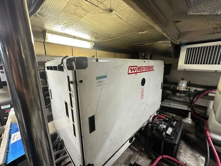Anna Yacht Photos Pics Engine room of 2001 Sea Ray 560 Sedan Bridge with Westerbeke generator.