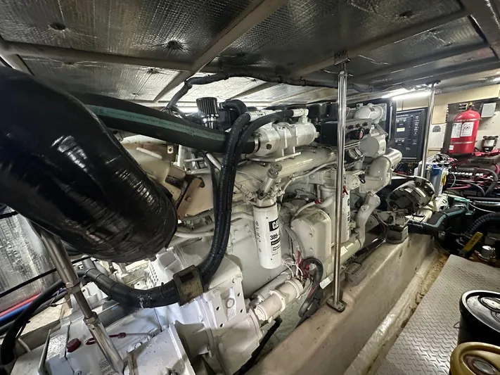 Anna Yacht Photos Pics Engine room of a 2001 Sea Ray 560 Sedan Bridge yacht, showcasing mechanical components.