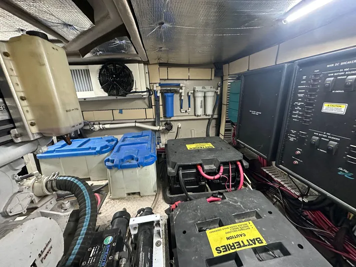 Anna Yacht Photos Pics Engine room of 2001 Sea Ray 560 Sedan Bridge with batteries and control panels.