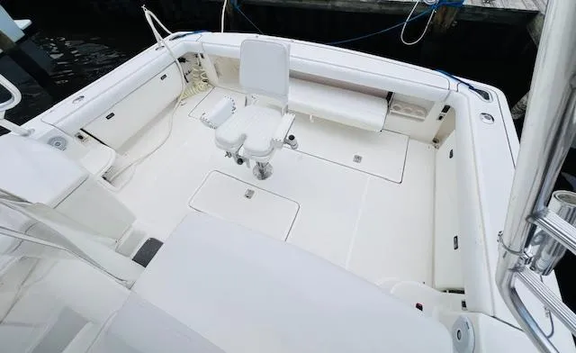 Yacht Photos Pics 2003 Tiara Yachts 3800 Open boat deck with seating and storage.