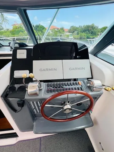  Yacht Photos Pics 2003 Tiara Yachts 3800 Open helm with Garmin navigation system and dual throttle controls.