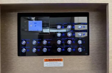  Yacht Photos Pics Control panel of a 2018 Prestige 680 yacht with illuminated buttons and warning label.