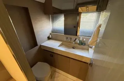  Yacht Photos Pics Luxurious bathroom in 2018 Prestige 680 yacht with modern fixtures and elegant design.