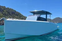2021 Scorpion 40 boat on clear blue water with scenic background.