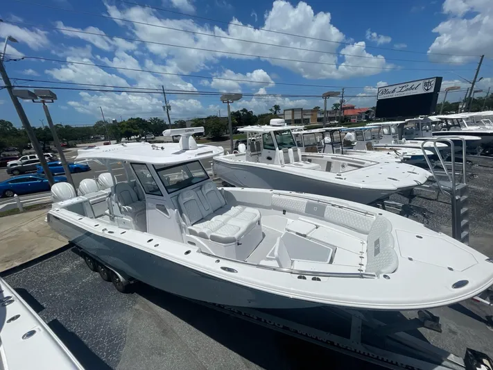 The Reel Commander Yacht Photos Pics 2026 Sea Fox 368 Commander boat displayed outdoors under a clear blue sky.