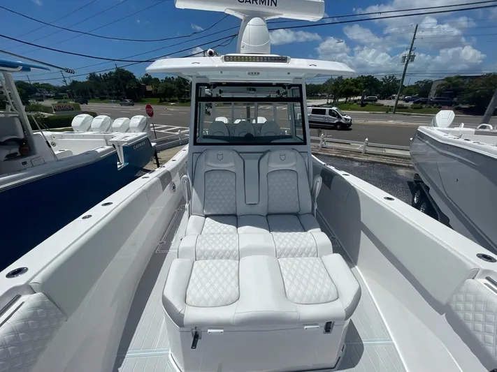 The Reel Commander Yacht Photos Pics 2026 Sea Fox 368 Commander boat with luxurious seating and modern design.