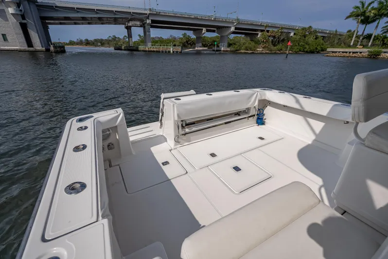 Escapade Yacht Photos Pics 2004 Tiara Yachts 3200 Open boat deck with bridge view.