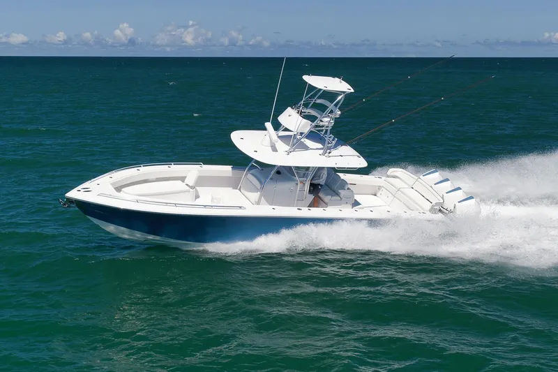  Yacht Photos Pics 2021 Bahama 41 boat cruising on open ocean waters.