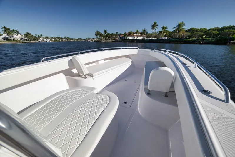  Yacht Photos Pics 2021 Bahama 41 boat interior with white seating, cruising on a sunny day.