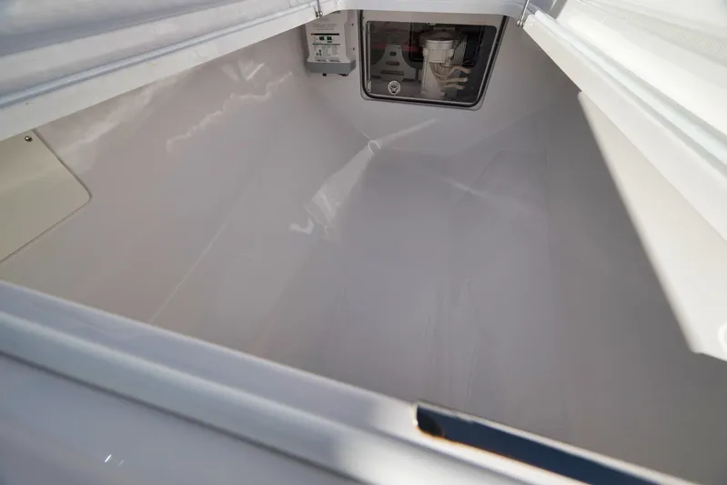  Yacht Photos Pics Interior view of a 2021 Bahama 41 storage compartment, showcasing spacious design and clean finish.