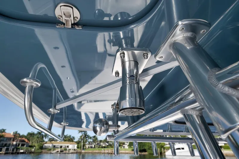  Yacht Photos Pics 2021 Bahama 41 boat detail showcasing stainless steel fixtures and blue canopy.