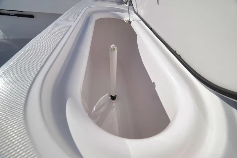  Yacht Photos Pics Storage compartment on a 2021 Bahama 41 boat, featuring a sleek, white interior design.