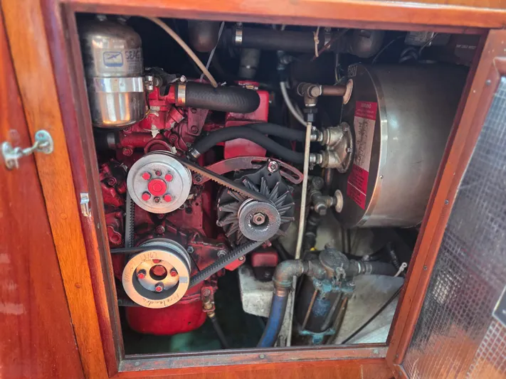 Perelandra Yacht Photos Pics Engine compartment of a 1968 Hinckley Bermuda 40 sailboat, showcasing mechanical components.