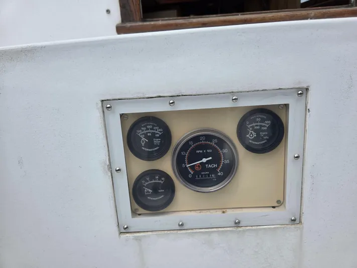 Perelandra Yacht Photos Pics Instrument panel of a 1968 Hinckley Bermuda 40 sailboat with gauges.