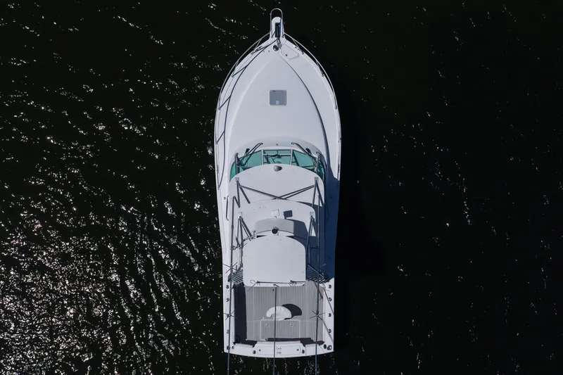  Yacht Photos Pics Aerial view of 2018 Albemarle 36 Express boat on dark water.