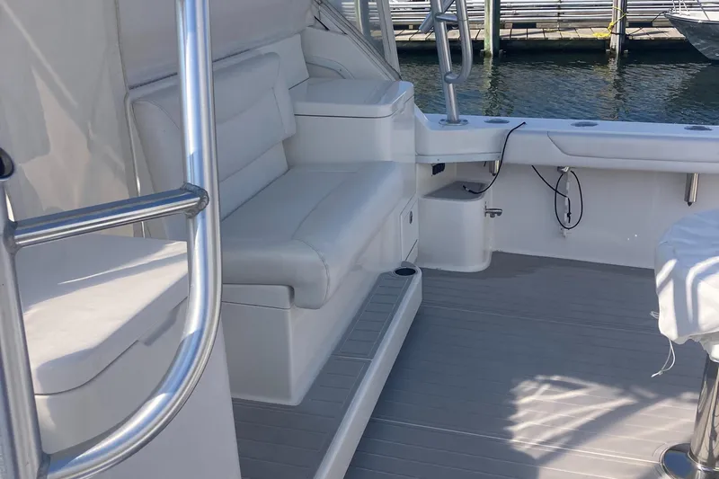  Yacht Photos Pics 2018 Albemarle 36 Express boat interior with white seating and sleek design.