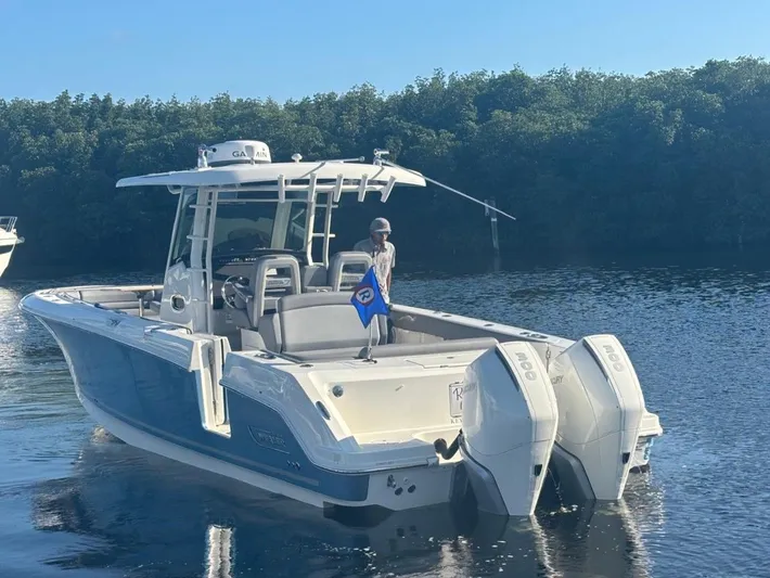  Yacht Photos Pics 2022 Boston Whaler 33 OUTRAGE on calm water.