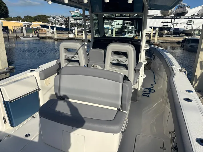  Yacht Photos Pics Interior view of a 2022 Boston Whaler 33 OUTRAGE boat at the dock.