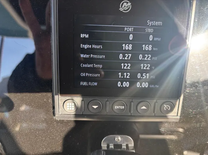  Yacht Photos Pics Boston Whaler 33 OUTRAGE 2022 engine display showing system data.