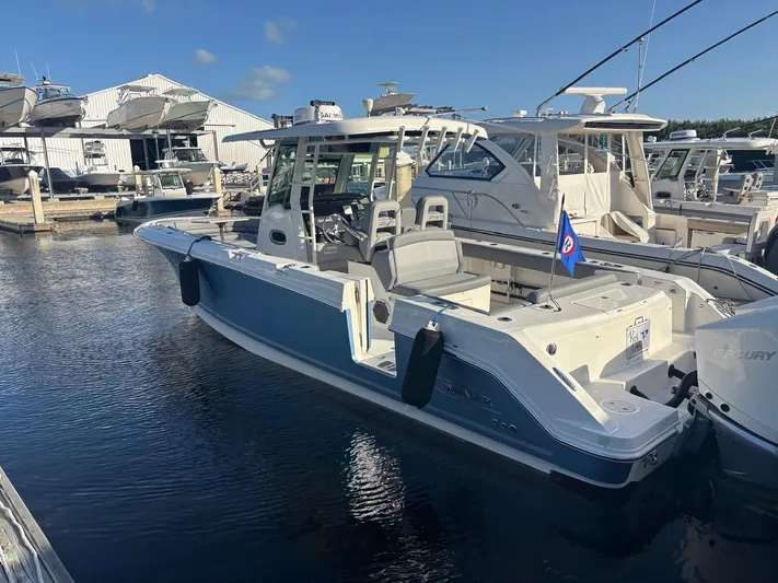  Yacht Photos Pics Boston Whaler 33 OUTRAGE 2022 docked at marina.