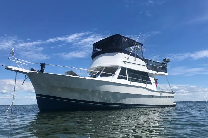  Yacht Photos Pics 1999 Mainship 350 Trawler at anchor on Georgian Bay.
