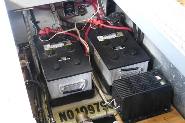  Yacht Photos Pics Battery compartment of a 1999 Mainship 350 Trawler with wiring and components.