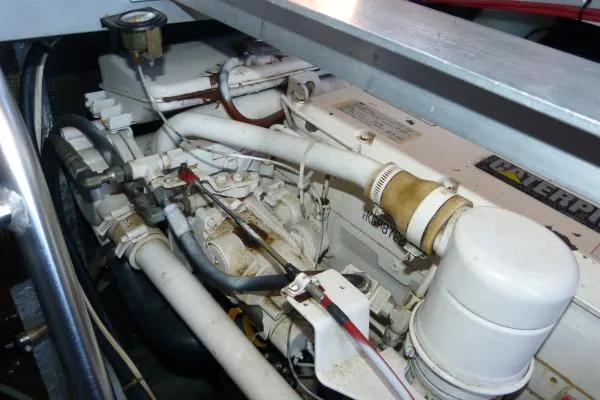  Yacht Photos Pics Engine compartment of a 1999 Mainship 350 Trawler, featuring a Caterpillar engine.