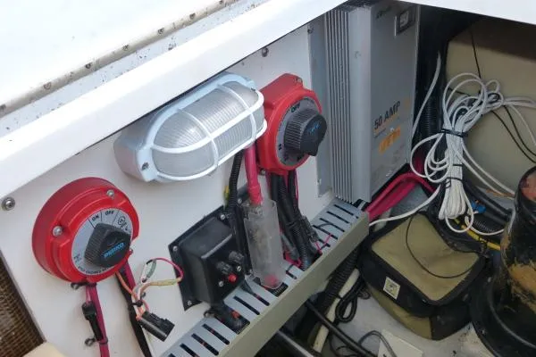  Yacht Photos Pics Electrical panel of a 1999 Mainship 350 Trawler with switches and wiring.