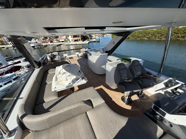  Yacht Photos Pics Luxurious 2021 Azimut Fly 78 yacht interior with modern seating and scenic water view.