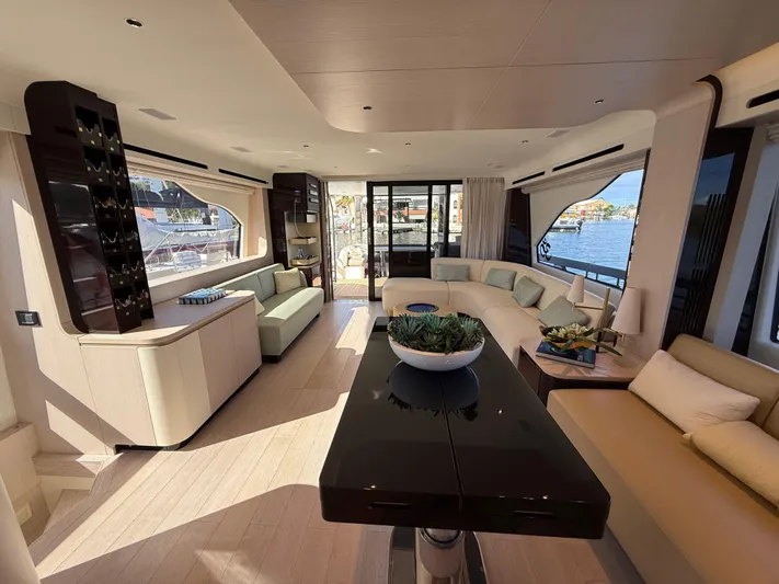  Yacht Photos Pics Luxurious interior of 2021 Azimut Fly 78 yacht with elegant seating and large windows.