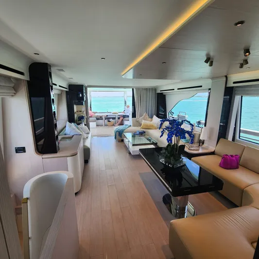  Yacht Photos Pics Luxurious interior of 2021 Azimut Fly 78 yacht with elegant seating and ocean view.