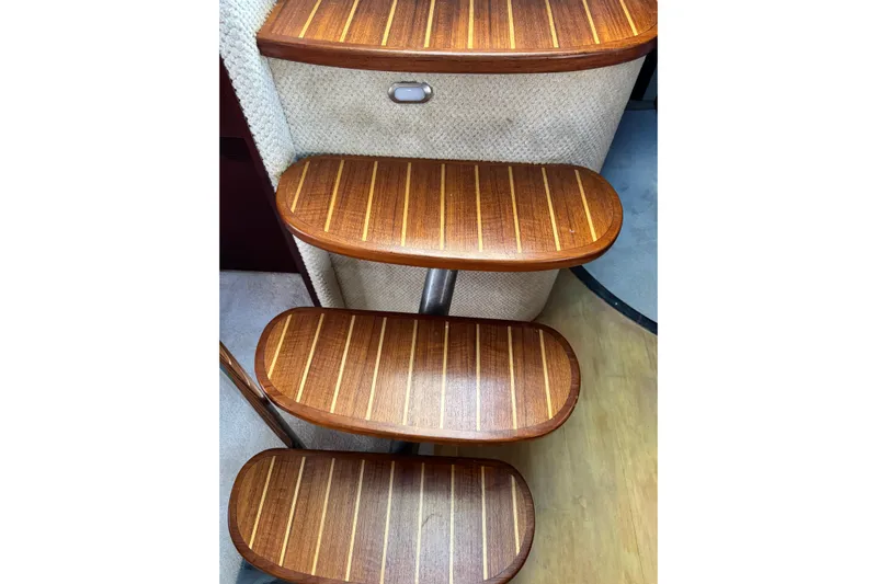  Yacht Photos Pics Wooden steps on a 2006 Sea Ray 48 Sundancer yacht interior.