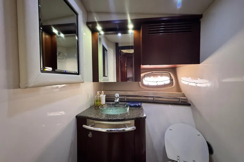  Yacht Photos Pics Luxurious bathroom in 2006 Sea Ray 48 Sundancer yacht with modern fixtures.