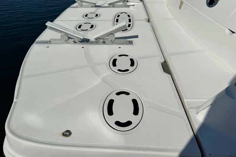  Yacht Photos Pics 2006 Sea Ray 48 Sundancer boat deck with cleats and circular fittings.