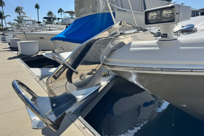  Yacht Photos Pics 2006 Sea Ray 48 Sundancer with Rocna anchor at marina, sunny day.