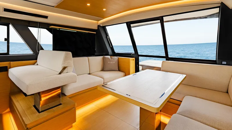 Available Now Yacht Photos Pics Luxurious interior of 2024 Pardo Yachts GT52 with ocean view and modern seating.