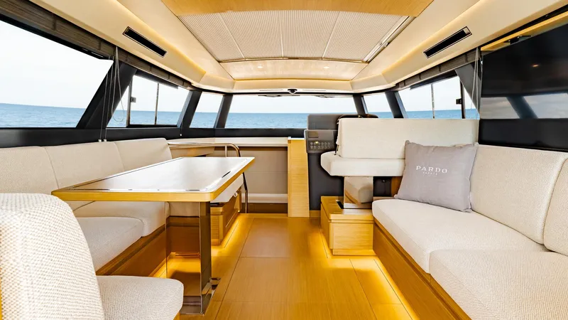 Available Now Yacht Photos Pics Luxurious interior of 2024 Pardo Yachts GT52 with elegant seating and ocean view.