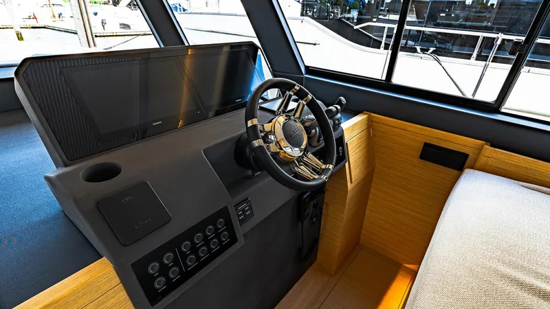 Available Now Yacht Photos Pics 2024 Pardo Yachts GT52 helm with modern controls and sleek design.