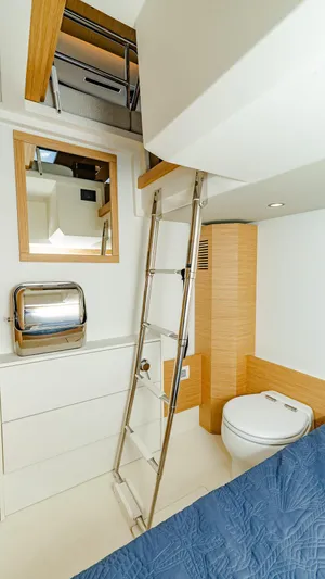 Available Now Yacht Photos Pics 2024 Pardo Yachts GT52 interior with ladder, modern design, and compact bathroom.