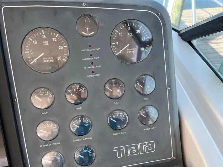  Yacht Photos Pics Dashboard of a 2001 Tiara Yachts 4100 Open, featuring various gauges and controls.