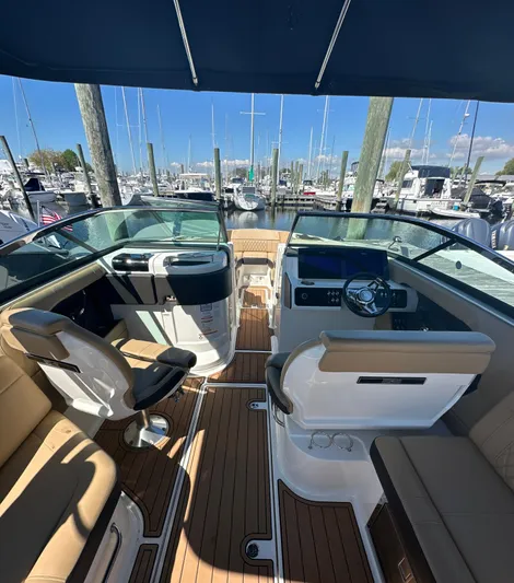  Yacht Photos Pics 2019 Sea Ray SLX 280 boat interior with luxurious seating and modern dashboard.