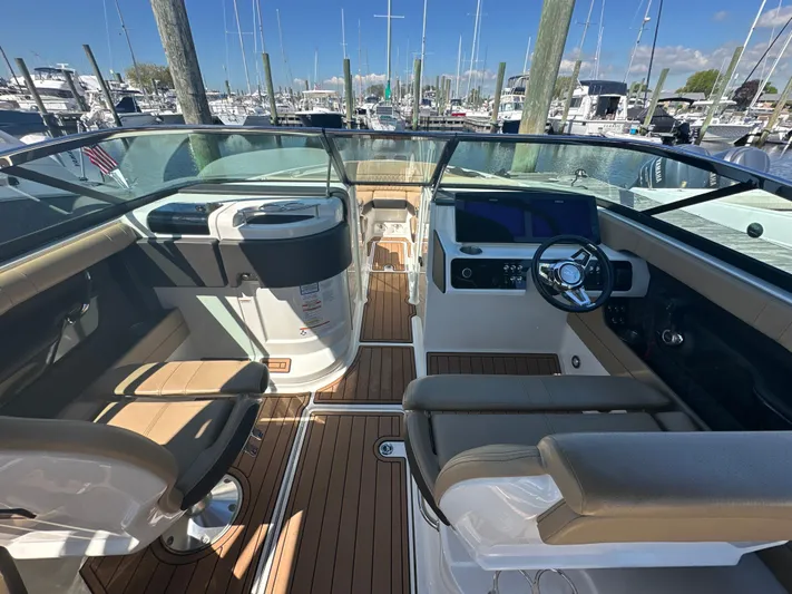  Yacht Photos Pics 2019 Sea Ray SLX 280 boat interior with modern dashboard and seating at marina.