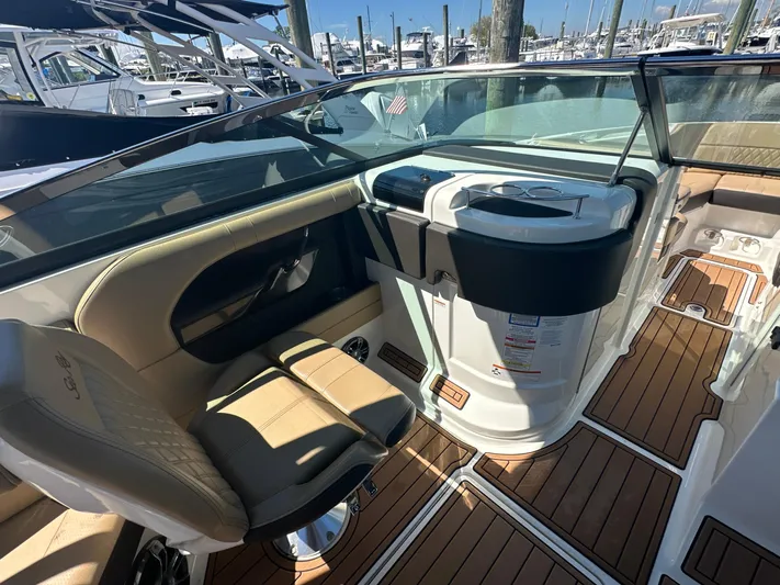  Yacht Photos Pics 2019 Sea Ray SLX 280 boat interior with luxurious seating and sleek dashboard design.
