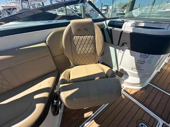  Yacht Photos Pics 2019 Sea Ray SLX 280 boat interior with tan leather seating and wood flooring.