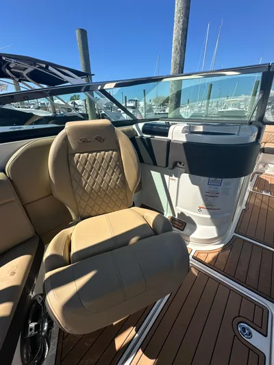  Yacht Photos Pics 2019 Sea Ray SLX 280 boat interior with tan seating and wood flooring.